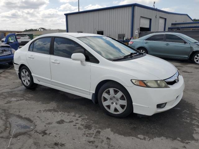 Photo 4 from auction – 2011 HONDA CIVIC LX with VIN 19XFA1F56BE008341