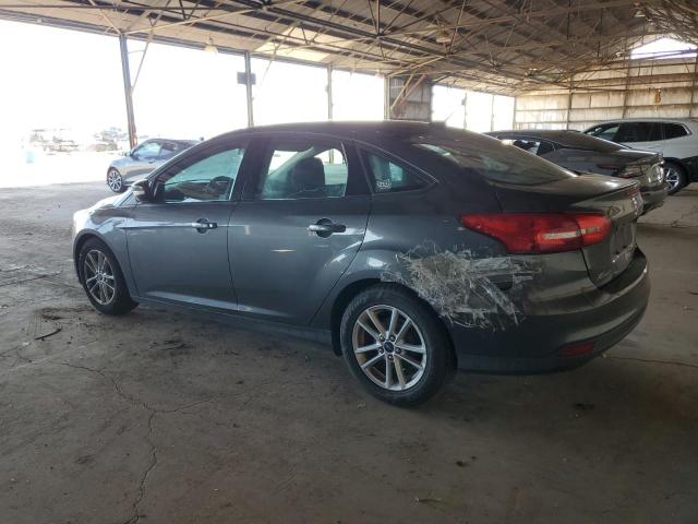 Снимка 2 от търг – 2015 FORD FOCUS SE с VIN 1FADP3F22FL327410