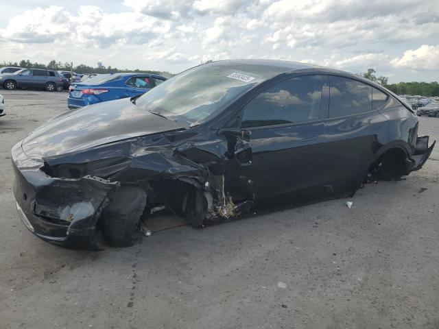 TESLA MODEL Y 2023 с VIN 7SAYGDEF0PF707570 - Фото с аукциона