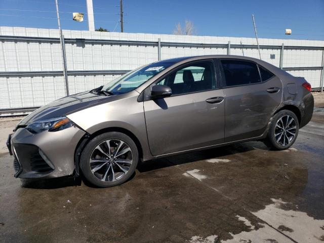 TOYOTA COROALLA 2017 with VIN 5YFBURHEXHP585978 - Photo from auction