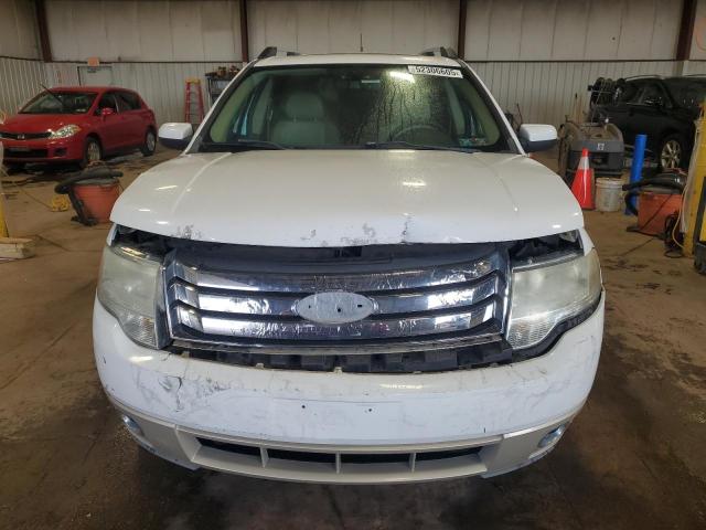 Снимка 5 от търг – 2008 FORD TAURUS X E с VIN 1FMDK07W28GA38429