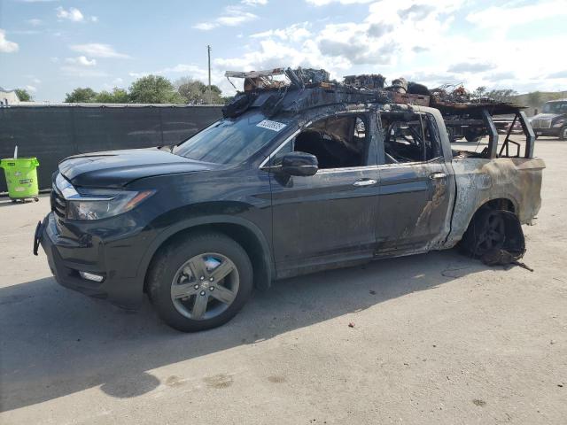 HONDA RIDGELINE 2023 with VIN 5FPYK3F74PB044766 - Photo from auction