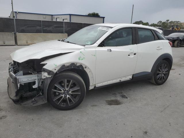 MAZDA CX-3 TOURI 2018 with VIN JM1DKFC78J0331319 - Photo from auction