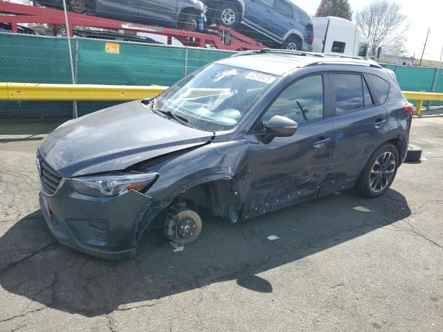 MAZDA CX-5 GT 2016 with VIN JM3KE4DY6G0674270 - Photo from auction