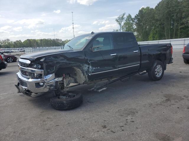 CHEVROLET SILVERADO 2015 with VIN 1GC1KWE88FF174825 - Photo from auction