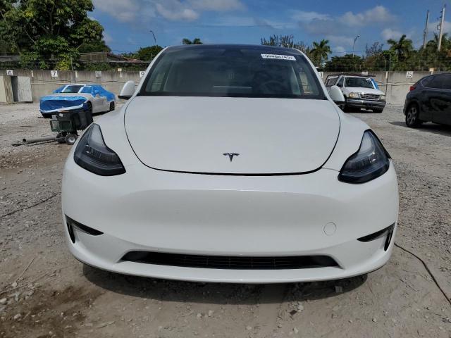 Photo 5 from auction – 2023 TESLA MODEL Y with VIN 7SAYGDEE1PF595496