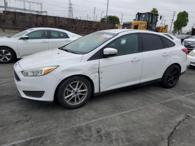 FORD FOCUS SE 2016 с VIN 1FADP3F22GL270420 - Снимка от търг