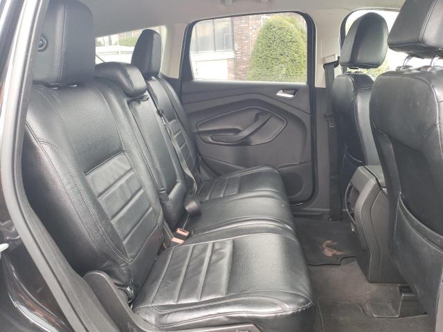 Photo 11 from auction – 2014 FORD ESCAPE SE with VIN 1FMCU9G94EUA88136