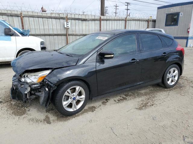 FORD FOCUS SE 2014 with VIN 1FADP3K21EL300090 - Photo from auction