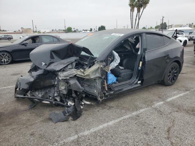 TESLA MODEL Y 2023 with VIN 7SAYGDEE0PF944633 - Photo from auction