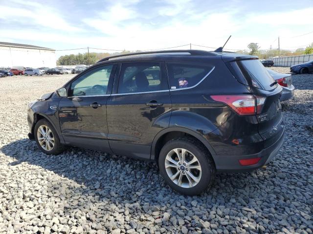 Photo 2 from auction – 2018 FORD ESCAPE SEL with VIN 1FMCU9HD8JUB18476