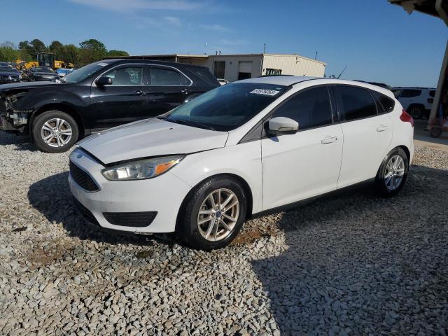 FORD FOCUS SE 2015 with VIN 1FADP3K21FL325220 - Photo from auction