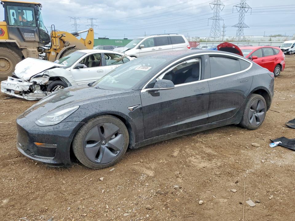 TESLA MODEL 3 2018 with VIN 5YJ3E1EA4JF020860 - Photo from auction