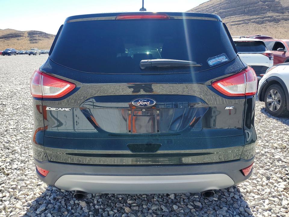 Photo 6 from auction – 2015 FORD ESCAPE with VIN 1FMCU0G75FUC63750