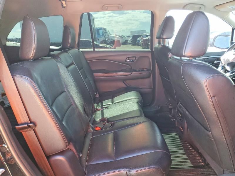 Photo 11 from auction – 2016 HONDA PILOT with VIN 5FNYF6H57GB093082