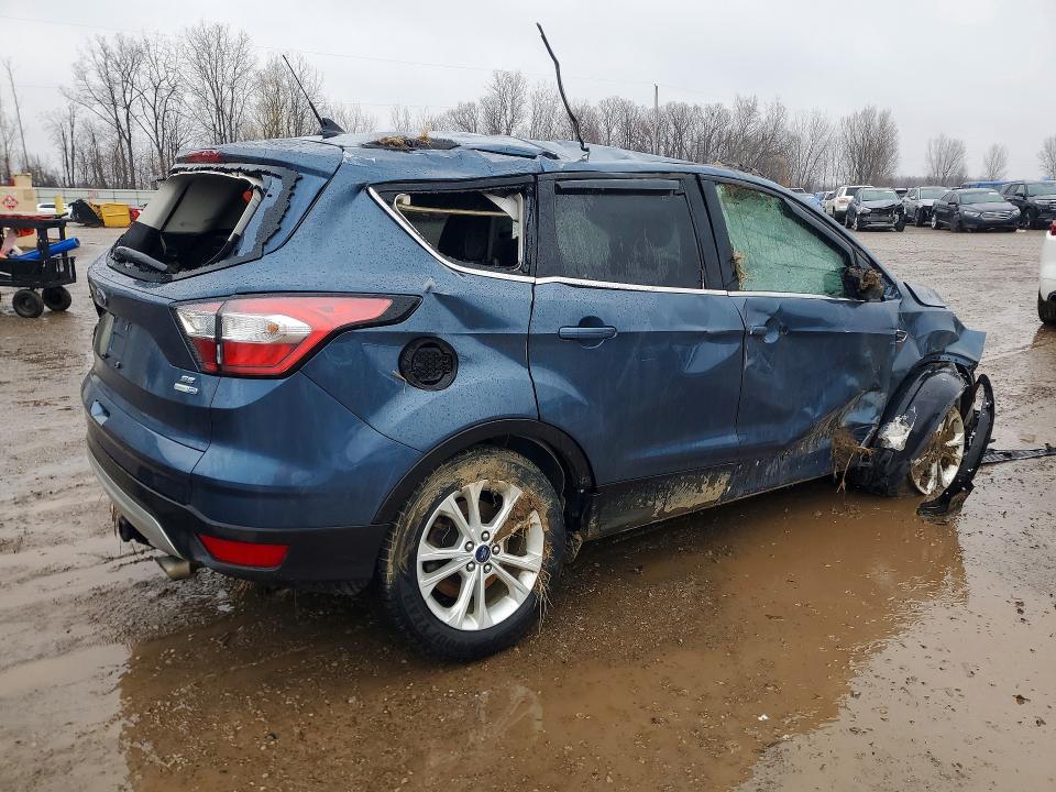 Photo 3 from auction – 2018 FORD ESCAPE with VIN 1FMCU9GD8JUB51222