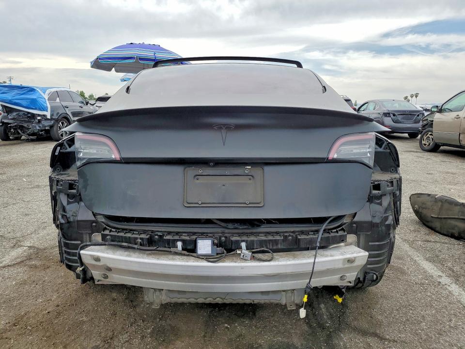 Photo 6 from auction – 2021 TESLA MODEL 3 with VIN 5YJ3E1EC9MF860672