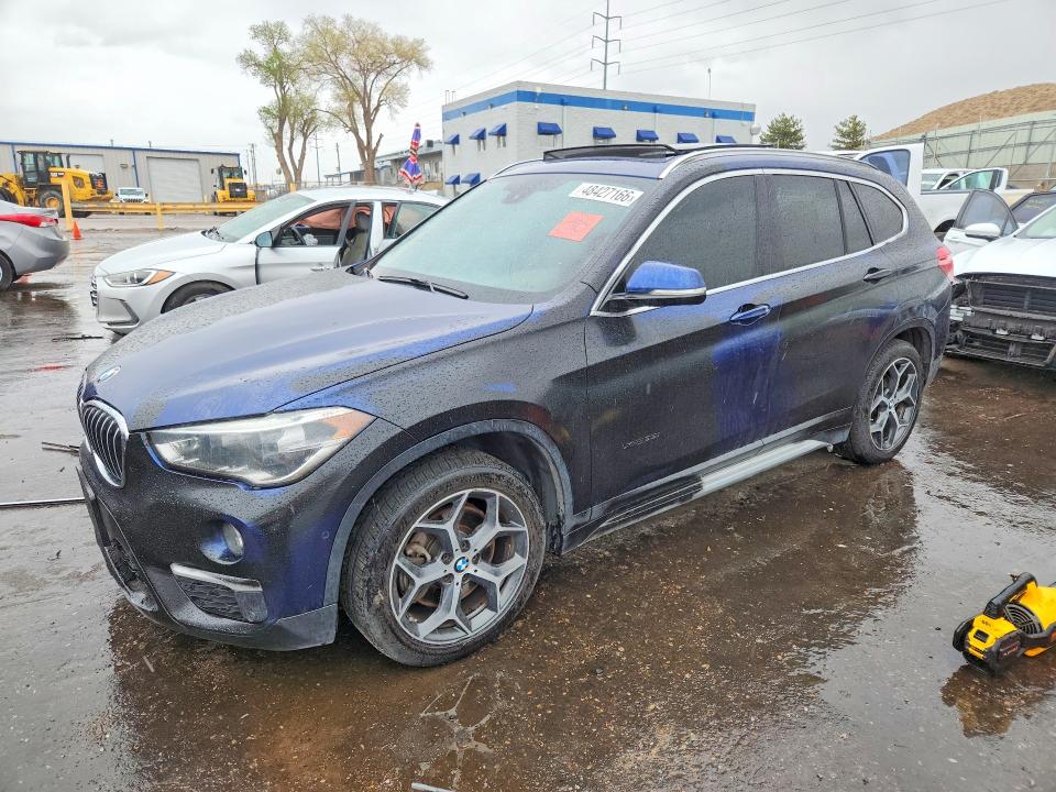 BMW X1 2017 z numerem VIN WBXHT3C36H5F85110 - Zdjęcie z aukcji
