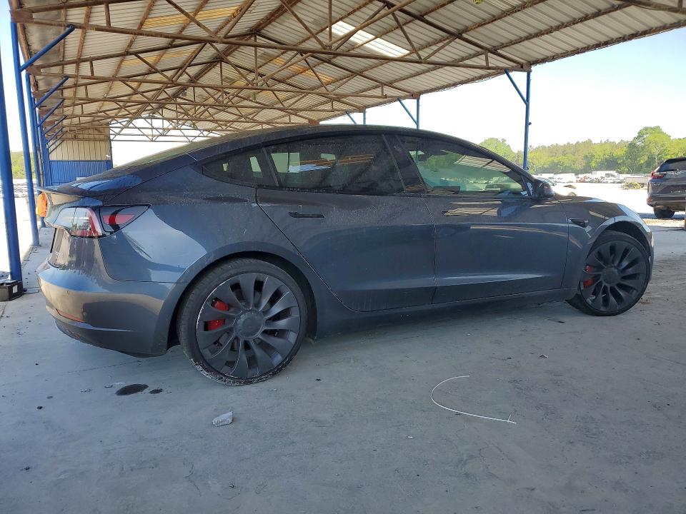 Photo 3 from auction – 2021 TESLA MODEL 3 with VIN 5YJ3E1EC4MF077453