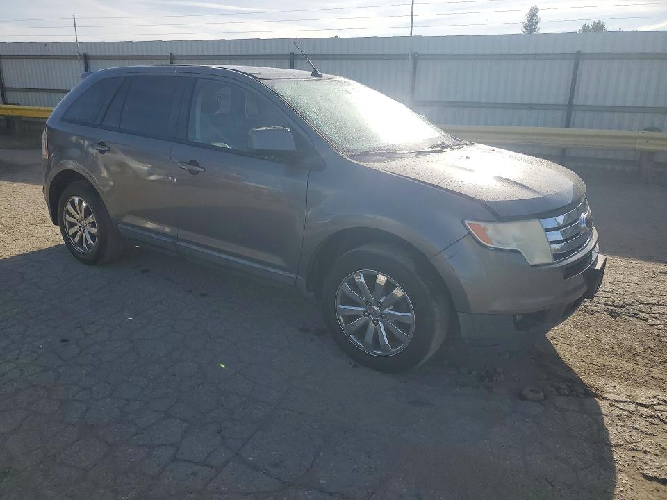 Photo 4 from auction – 2010 FORD EDGE with VIN 2FMDK4JC2ABB03931