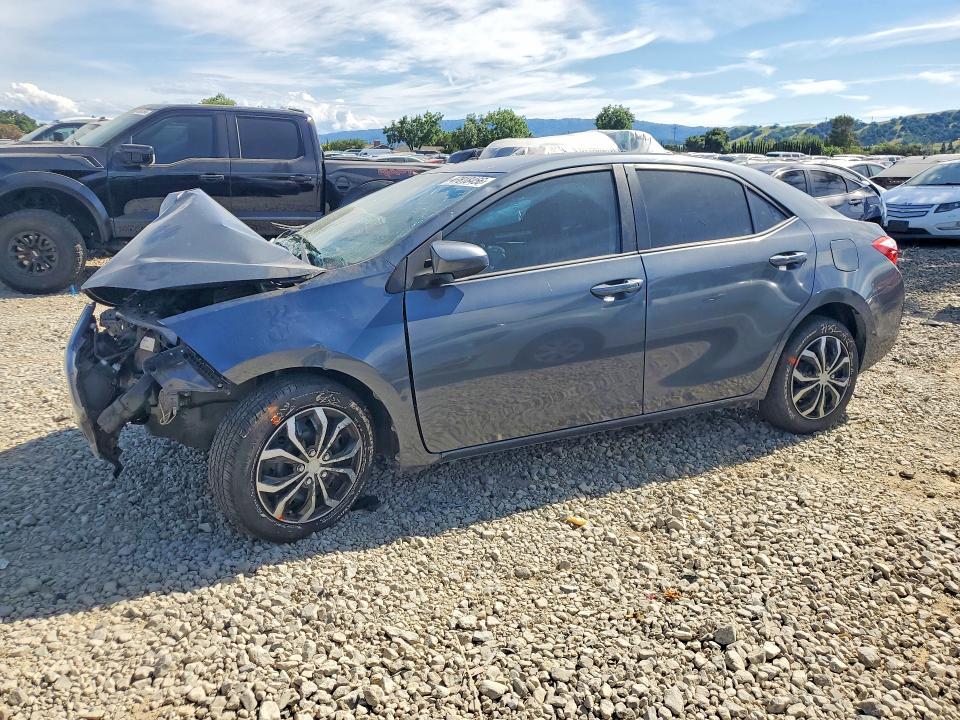 TOYOTA COROLLA 2015 with VIN 5YFBURHE4FP301600 - Photo from auction