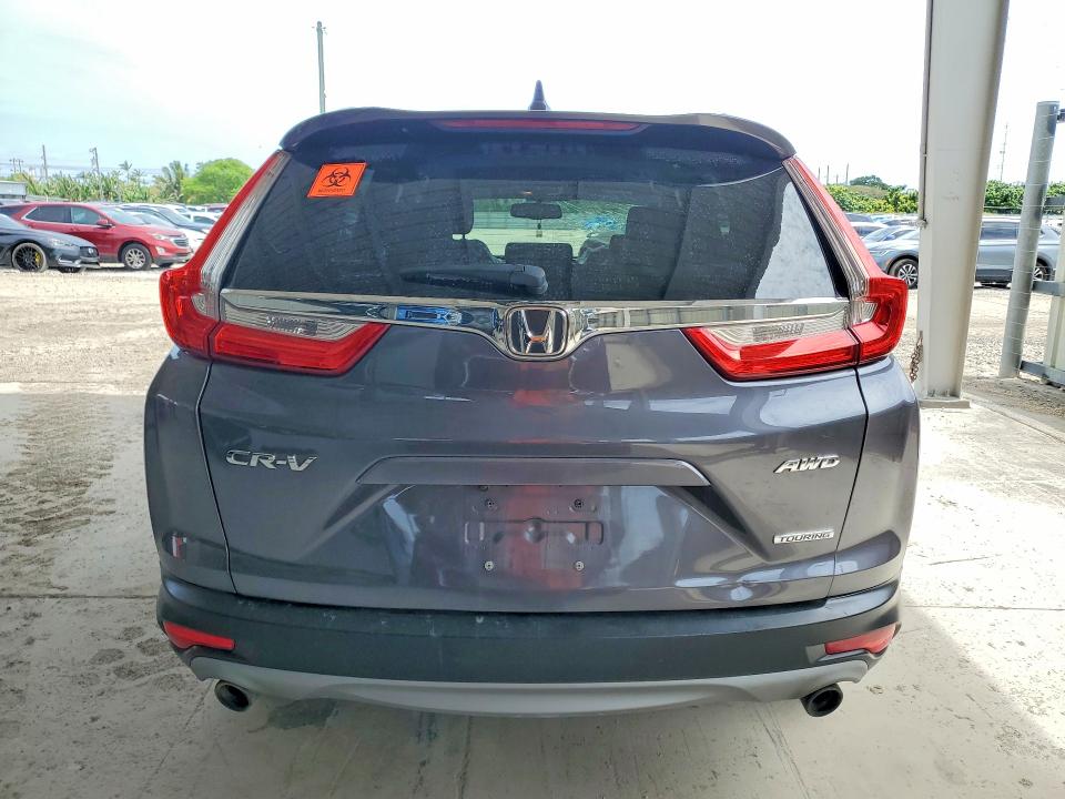 Photo 6 from auction – 2018 HONDA CR-V with VIN 2HKRW2H94JH674418