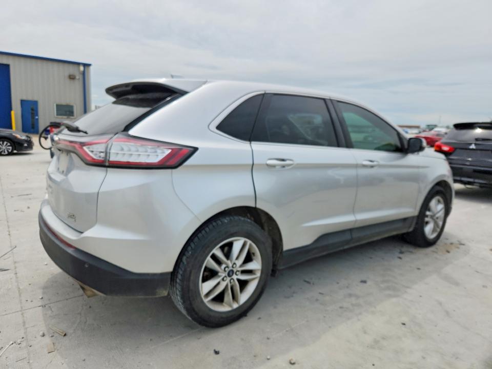 Photo 3 from auction – 2015 FORD EDGE with VIN 2FMTK3J94FBB60276
