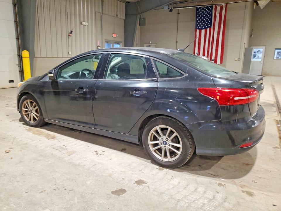 Снимка 2 от търг – 2015 FORD FOCUS с VIN 1FADP3F25FL217449