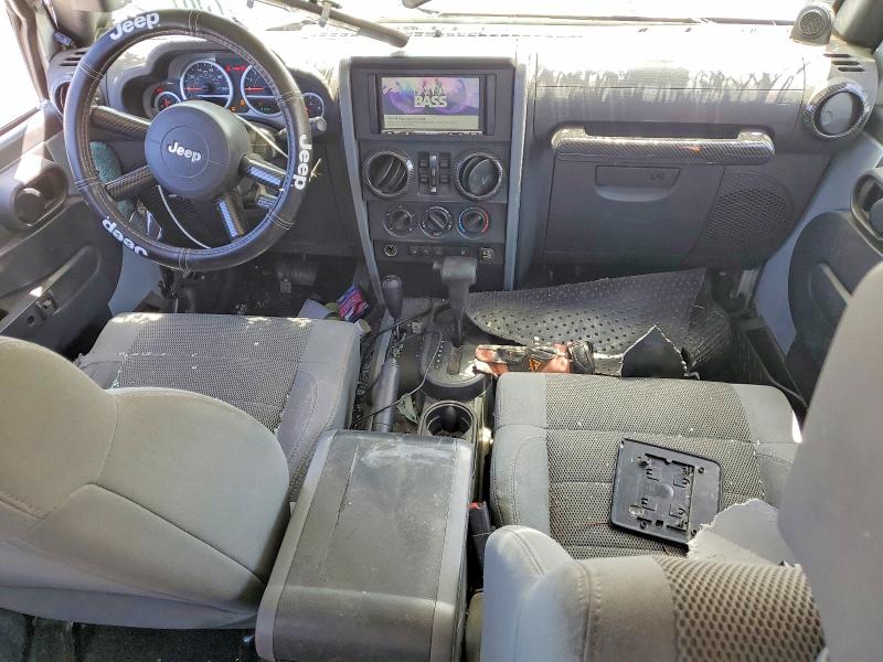 Photo 8 from auction – 2007 JEEP WRANGLER with VIN 1J8GA69197L166657
