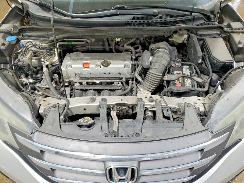 Photo 11 from auction – 2014 HONDA CR-V with VIN 5J6RM4H5XEL069507