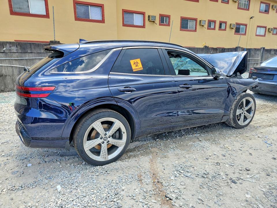 Photo 3 from auction – 2023 GENESIS GV70 with VIN KMUMADTB8PU121233