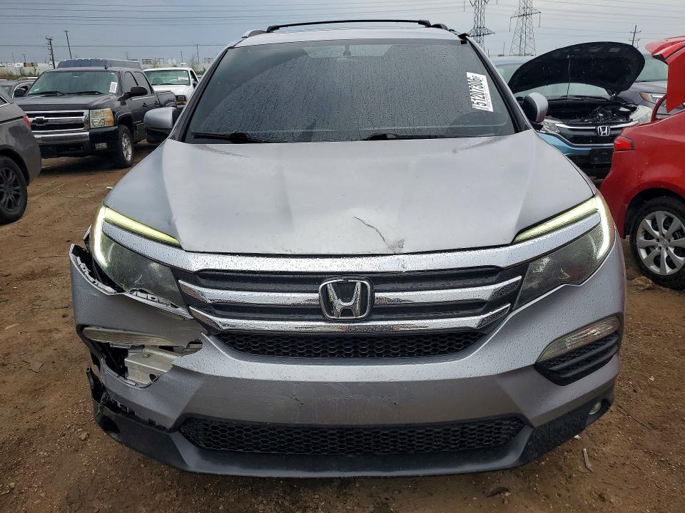 Photo 5 from auction – 2016 HONDA PILOT with VIN 5FNYF6H51GB009015