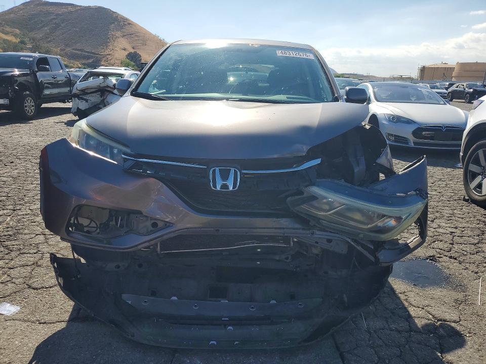Photo 5 from auction – 2016 HONDA CR-V with VIN 3CZRM3H54GG709091