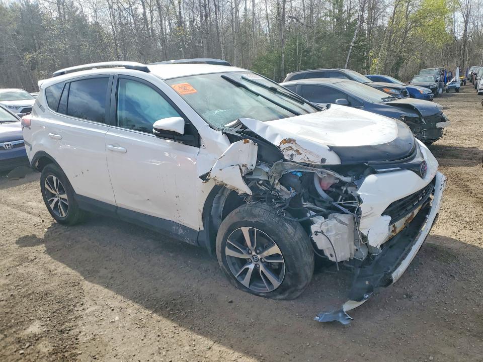 Photo 4 from auction – 2018 TOYOTA RAV4 with VIN 2T3ZFREV2JW469621