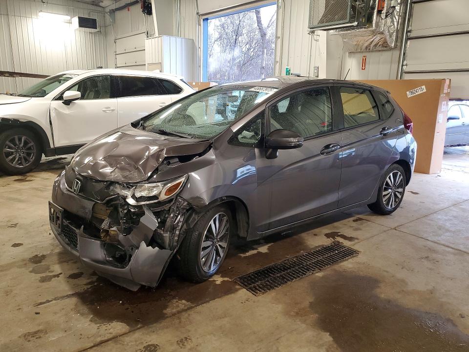 HONDA FIT 2017 with VIN JHMGK5H89HS019967 - Photo from auction