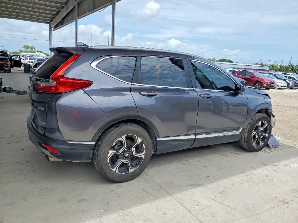 Photo 3 from auction – 2018 HONDA CR-V with VIN 2HKRW2H94JH674418