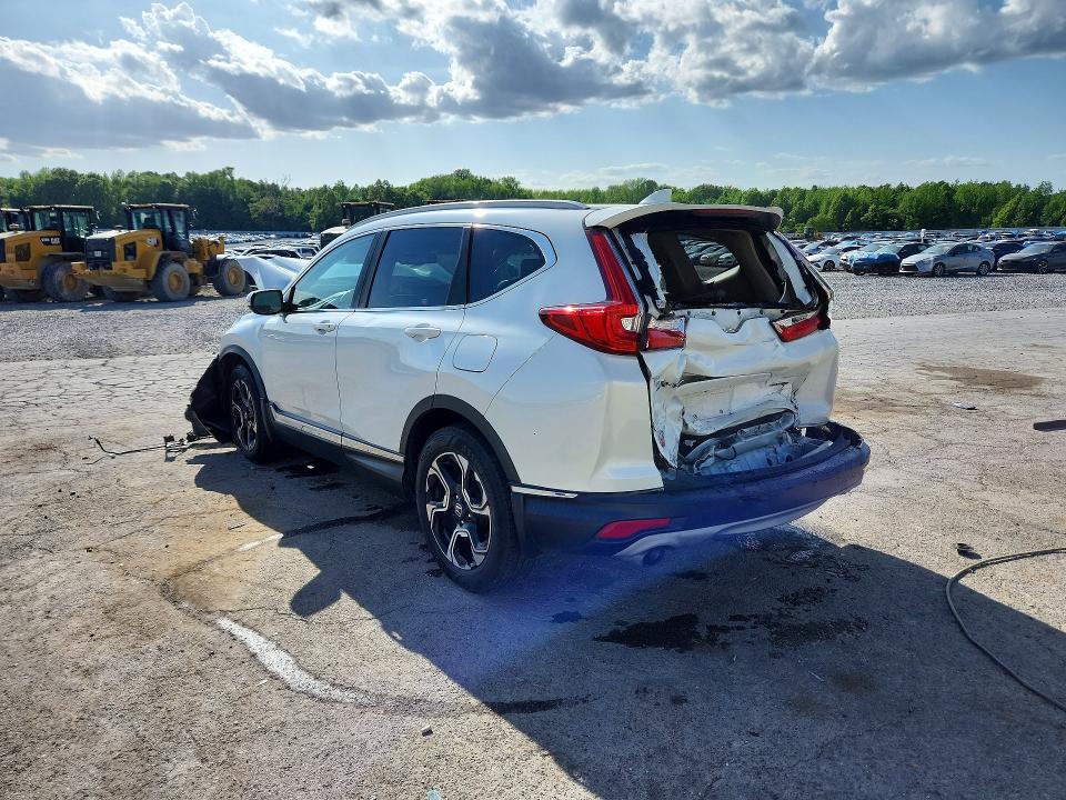 Photo 2 from auction – 2018 HONDA CR-V with VIN 2HKRW1H93JH506439