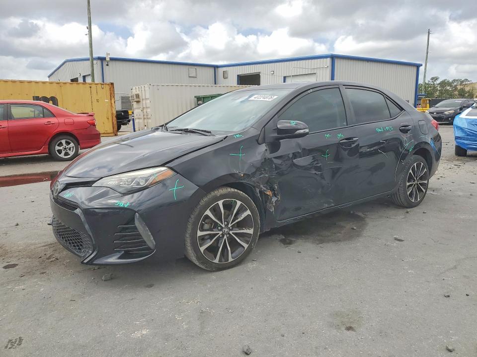 TOYOTA COROLLA 2017 with VIN 5YFBURHE9HP690267 - Photo from auction