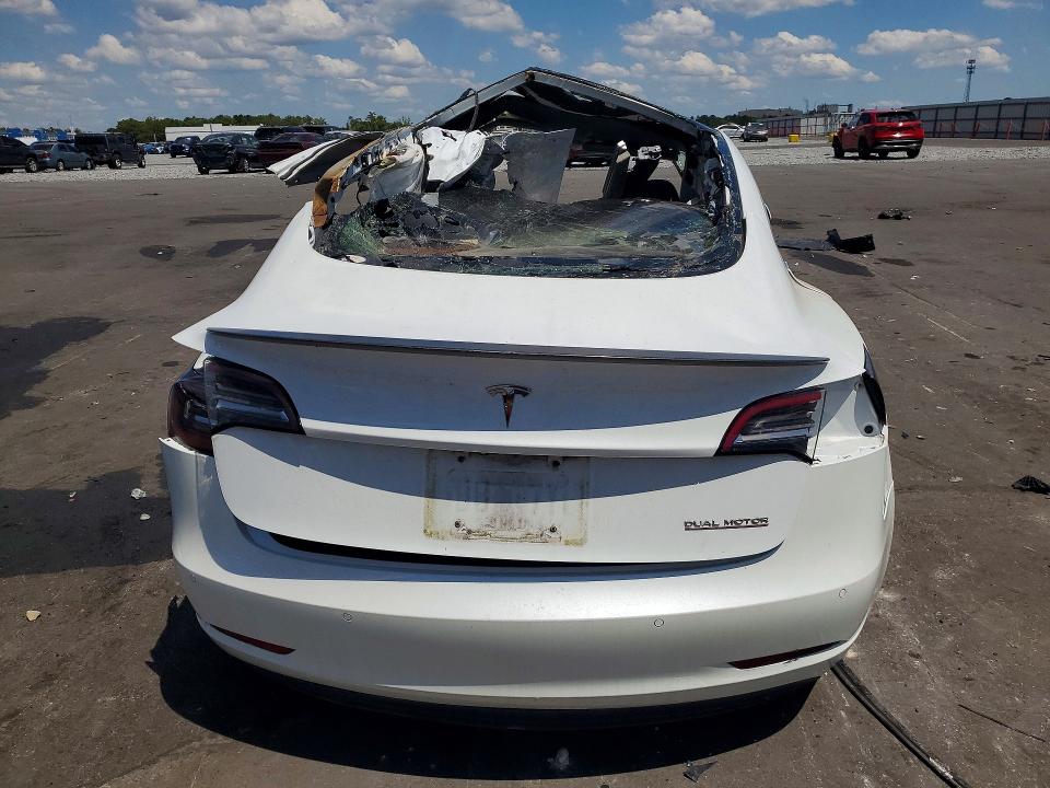 Photo 6 from auction – 2018 TESLA MODEL 3 with VIN 5YJ3E1EB8JF106522