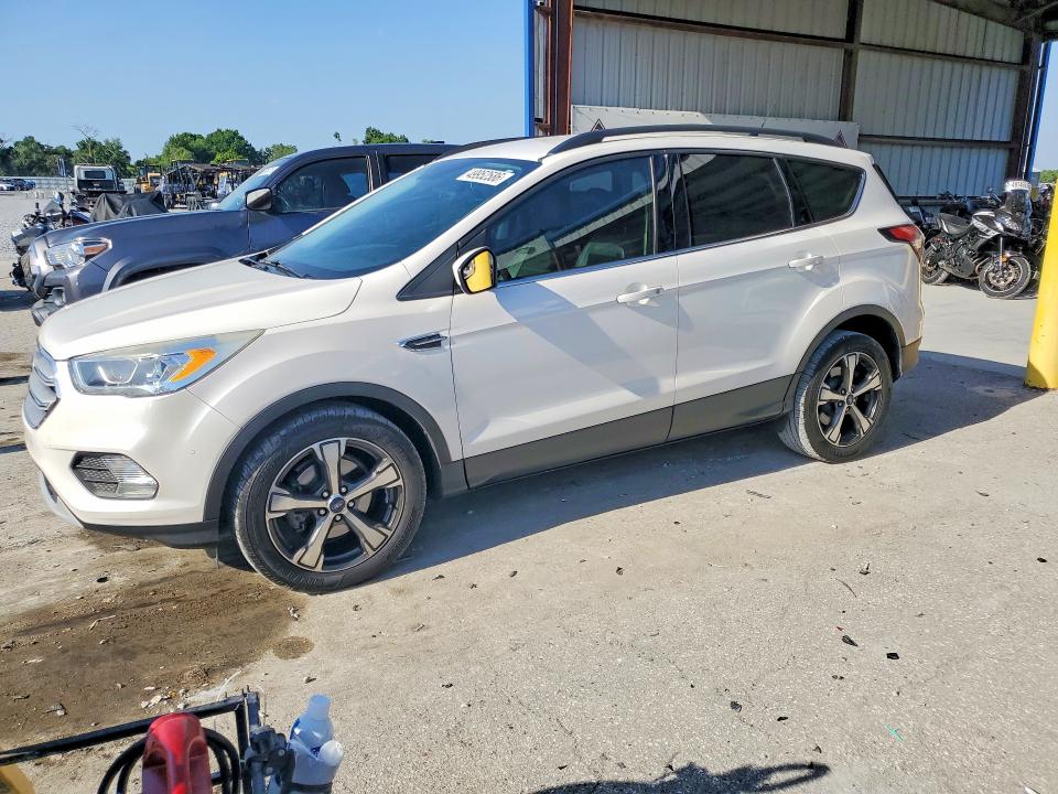 FORD ESCAPE 2018 with VIN 1FMCU0HD8JUB79838 - Photo from auction