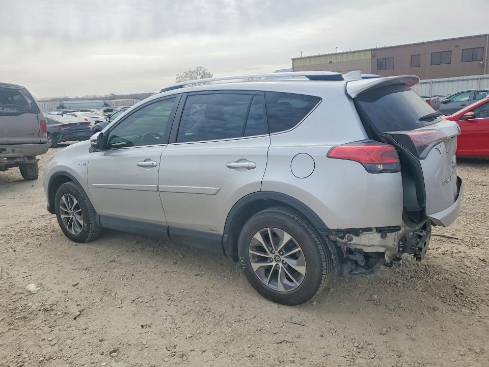 Photo 2 from auction – 2016 TOYOTA RAV4 HV with VIN JTMRJREV7GD013151
