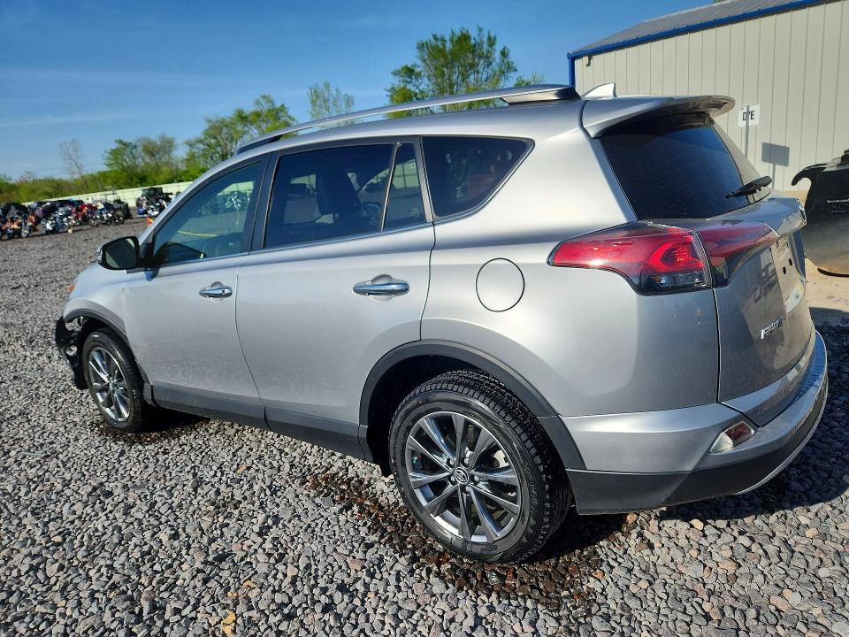 Photo 2 from auction – 2018 TOYOTA RAV4 with VIN JTMDFREV0JJ214362