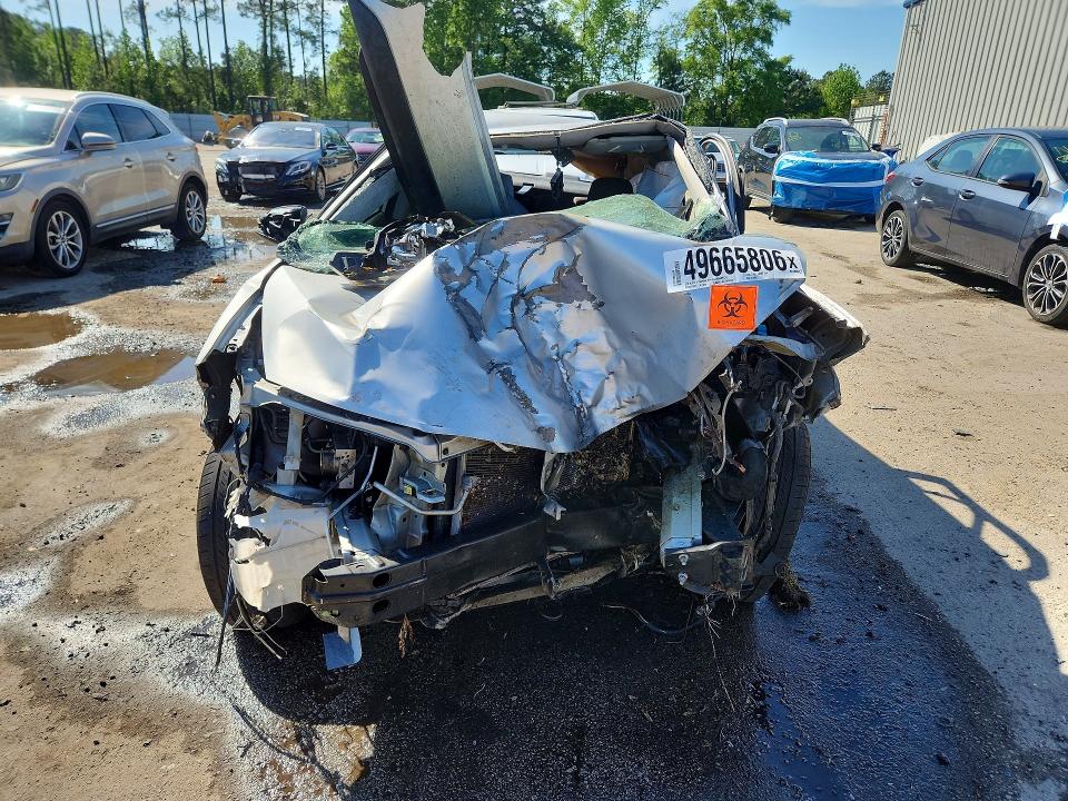 Photo 5 from auction – 2018 TOYOTA COROLLA with VIN 5YFBURHE0JP772006