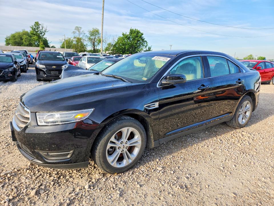 FORD TAURUS 2018 with VIN 1FAHP2E82JG142048 - Photo from auction