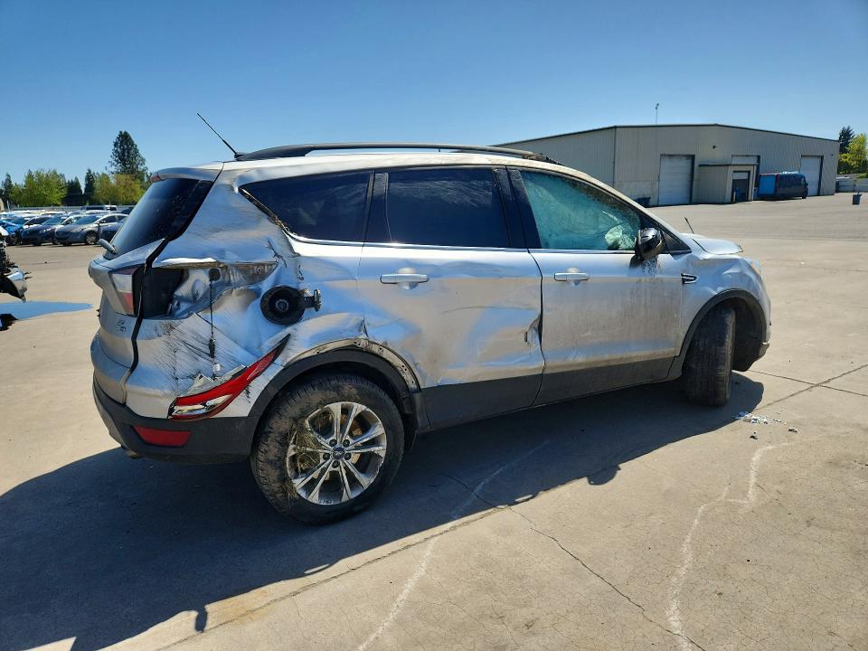 Photo 3 from auction – 2017 FORD ESCAPE with VIN 1FMCU9G92HUE24371