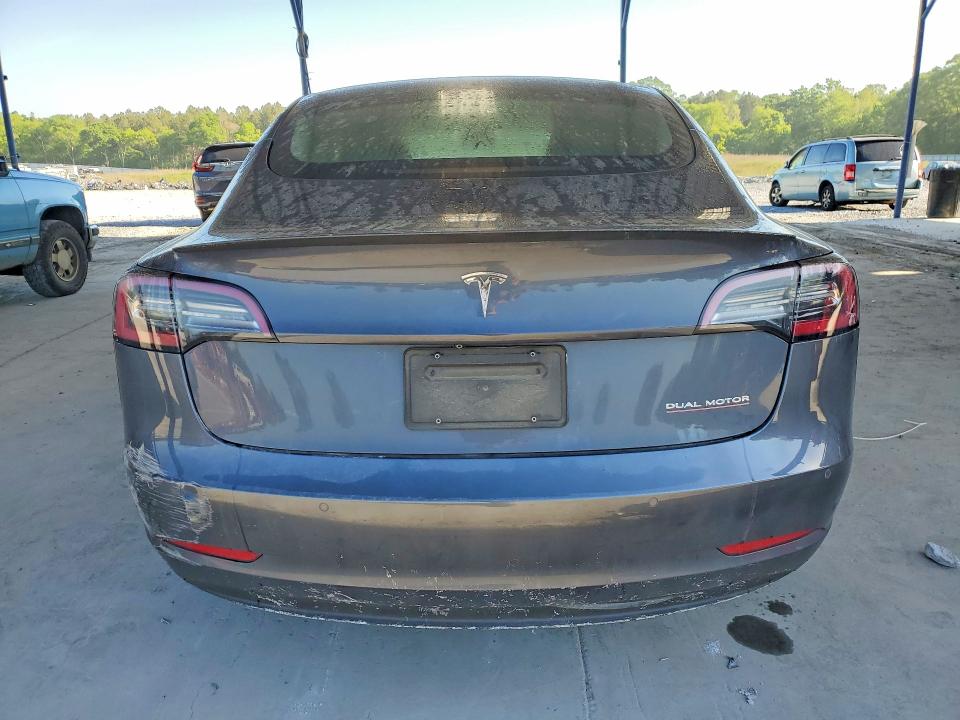 Photo 6 from auction – 2021 TESLA MODEL 3 with VIN 5YJ3E1EC4MF077453