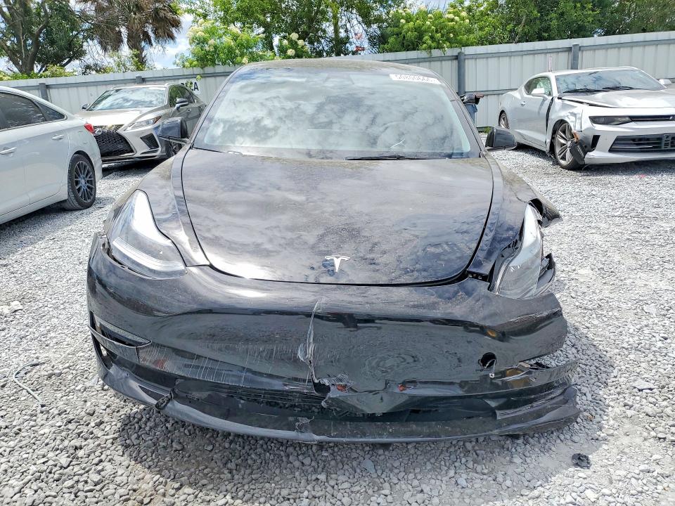 Photo 5 from auction – 2023 TESLA MODEL 3 with VIN 5YJ3E1EA9PF643979