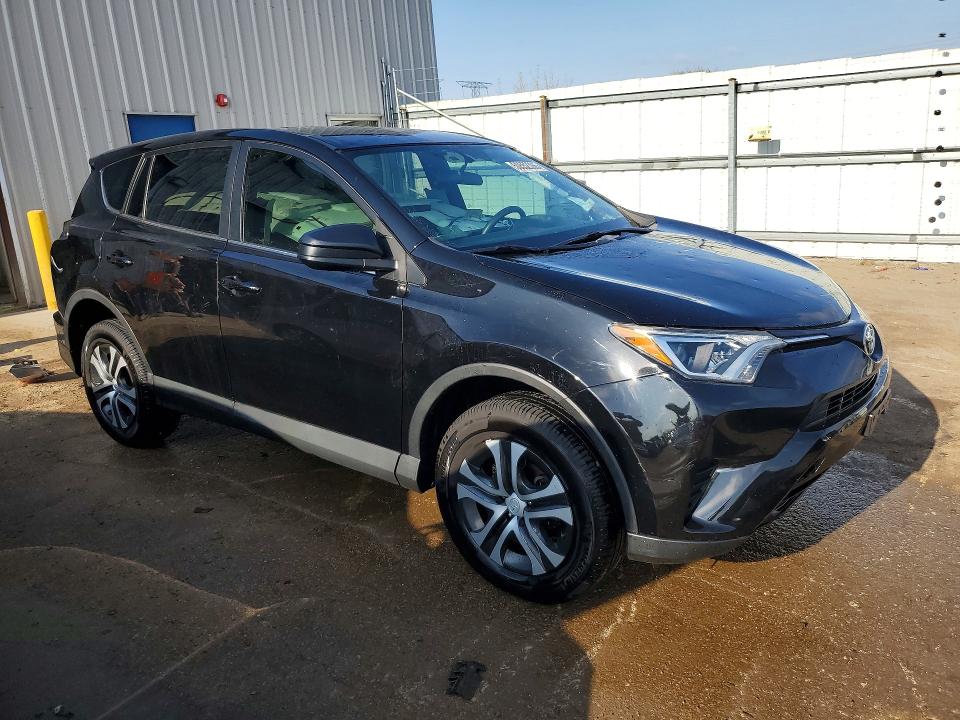 Photo 4 from auction – 2016 TOYOTA RAV4 with VIN 2T3ZFREV6GW281614