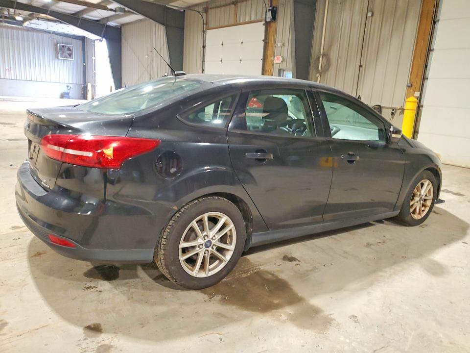 Снимка 3 от търг – 2015 FORD FOCUS с VIN 1FADP3F25FL217449
