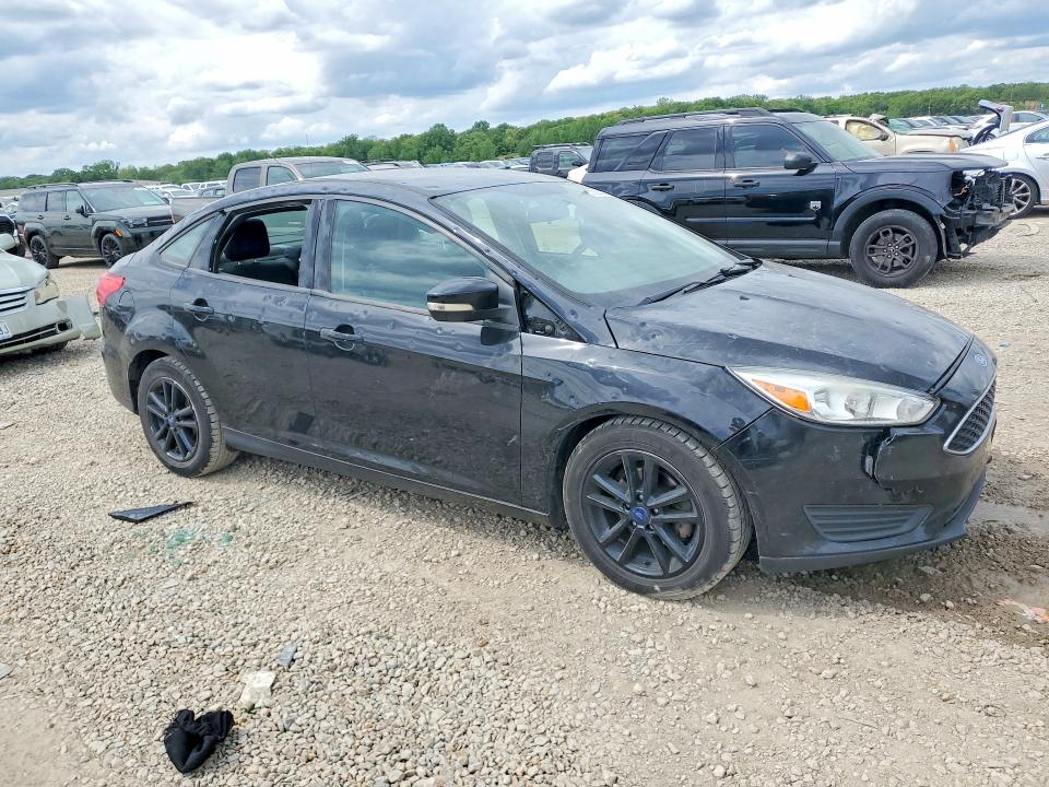 Photo 4 from auction – 2016 FORD FOCUS with VIN 1FADP3F2XGL359555